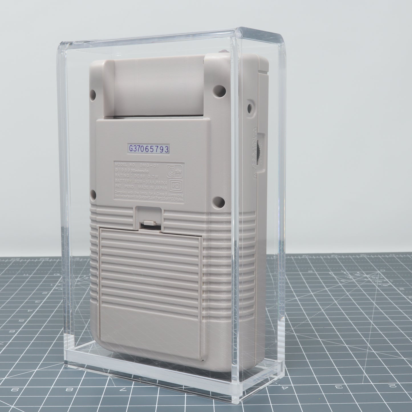 Game Boy DMG - Display Capsule in acrylic display case.