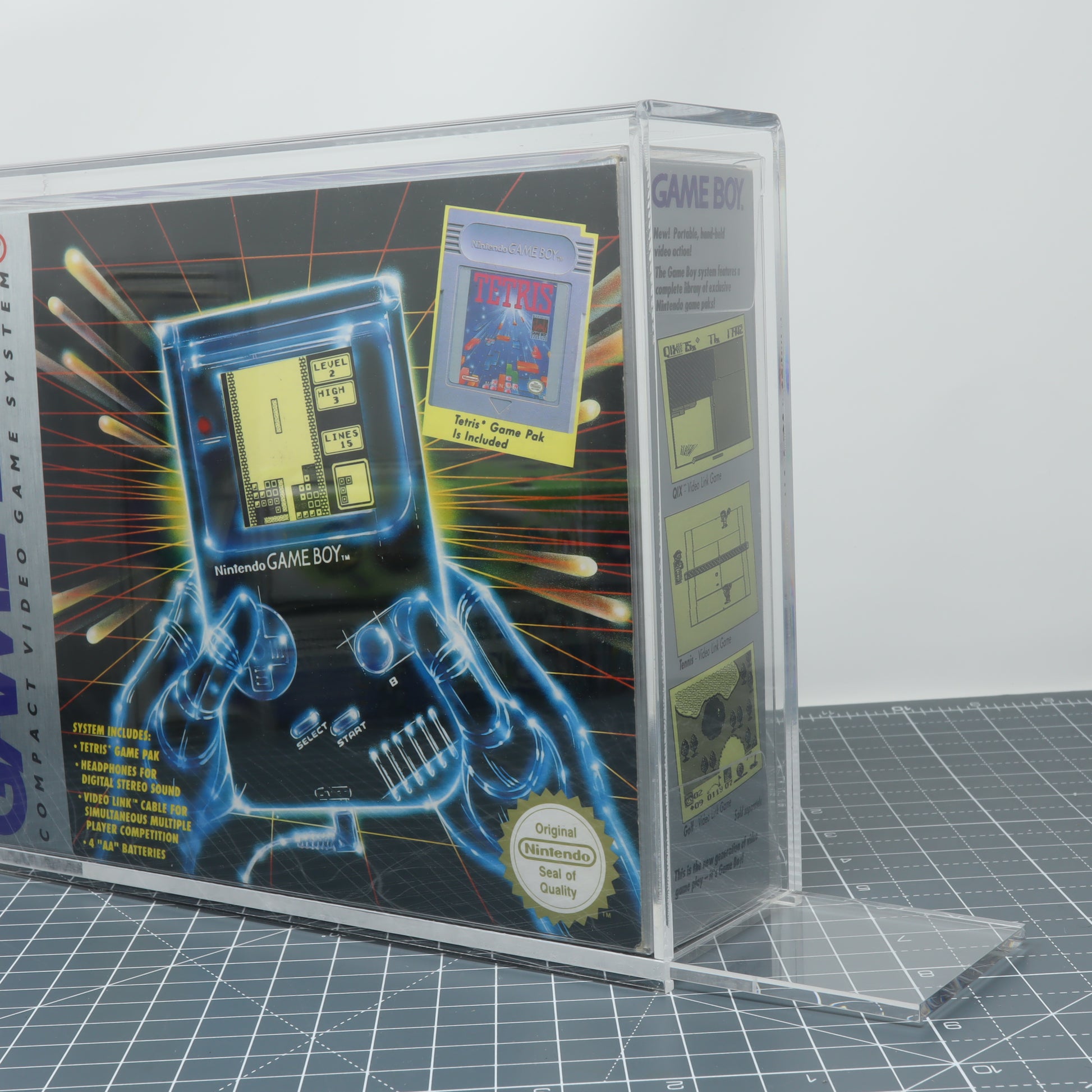 Original Game Boy DMG big box custom acrylic display capsule left image showing sliding door