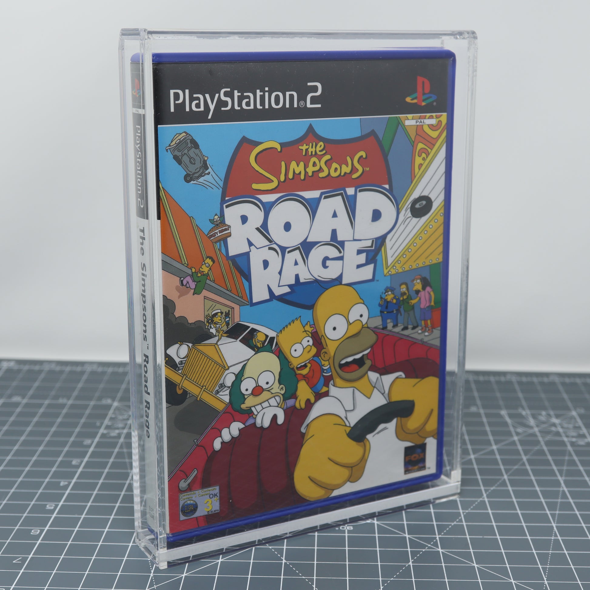 Lab Fifteen Co custom acrylic display capsule for Sony Playstation 2 game case simpsons road rage front cover