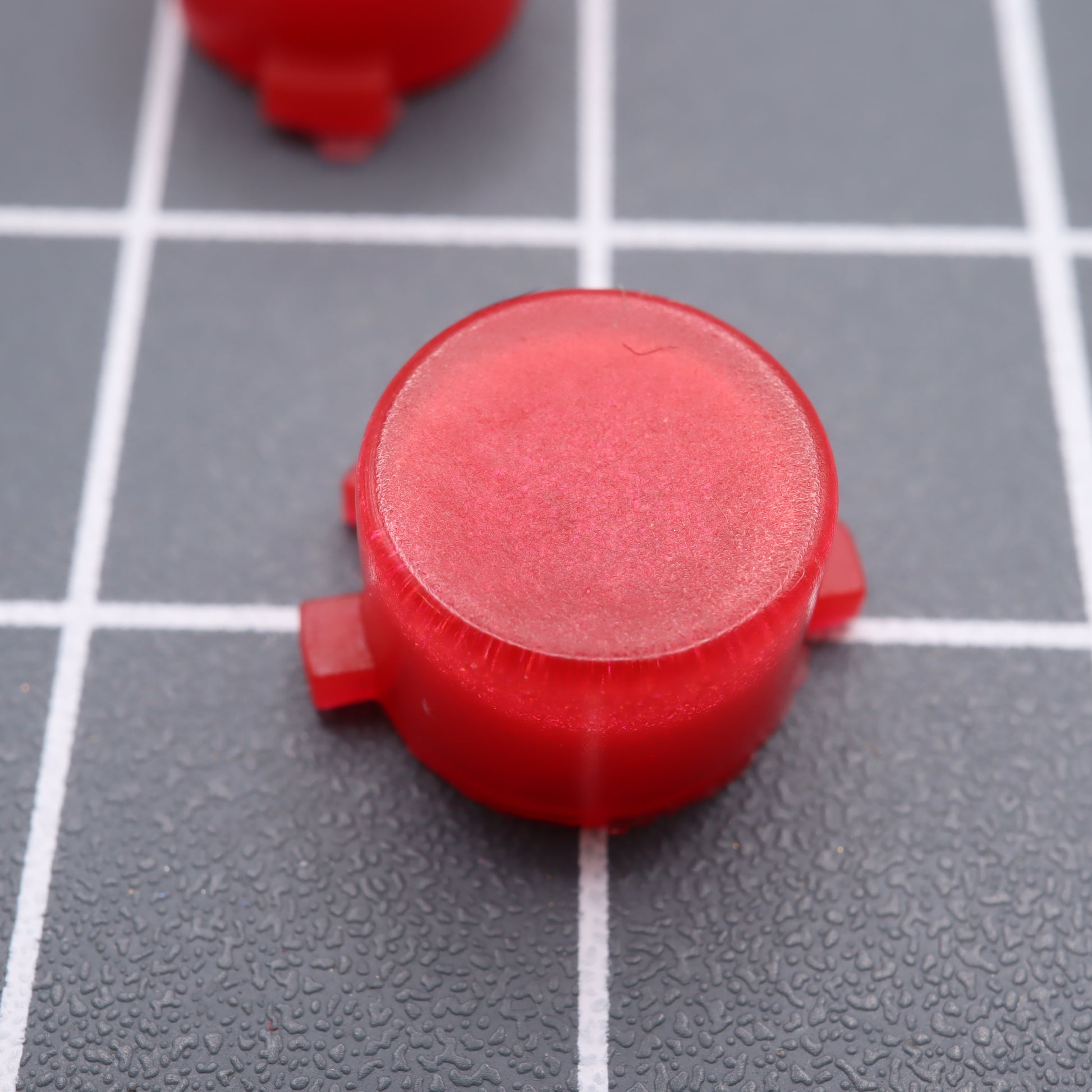 Lab Fifteen co custom resin Strawberry Candy action button close up for the Analogue Pocket