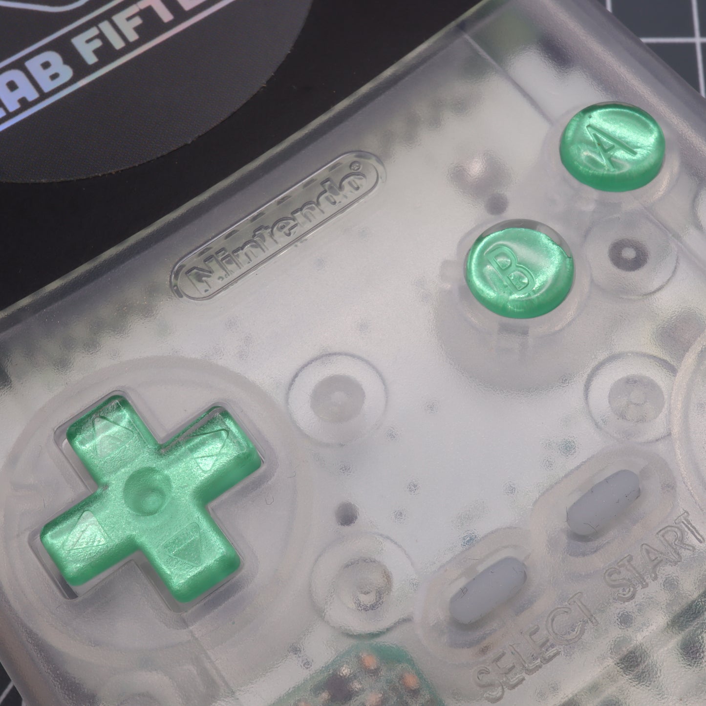 Game Boy Color button with lab fifteen co chrome mint green custom buttons inside clear transparent shell