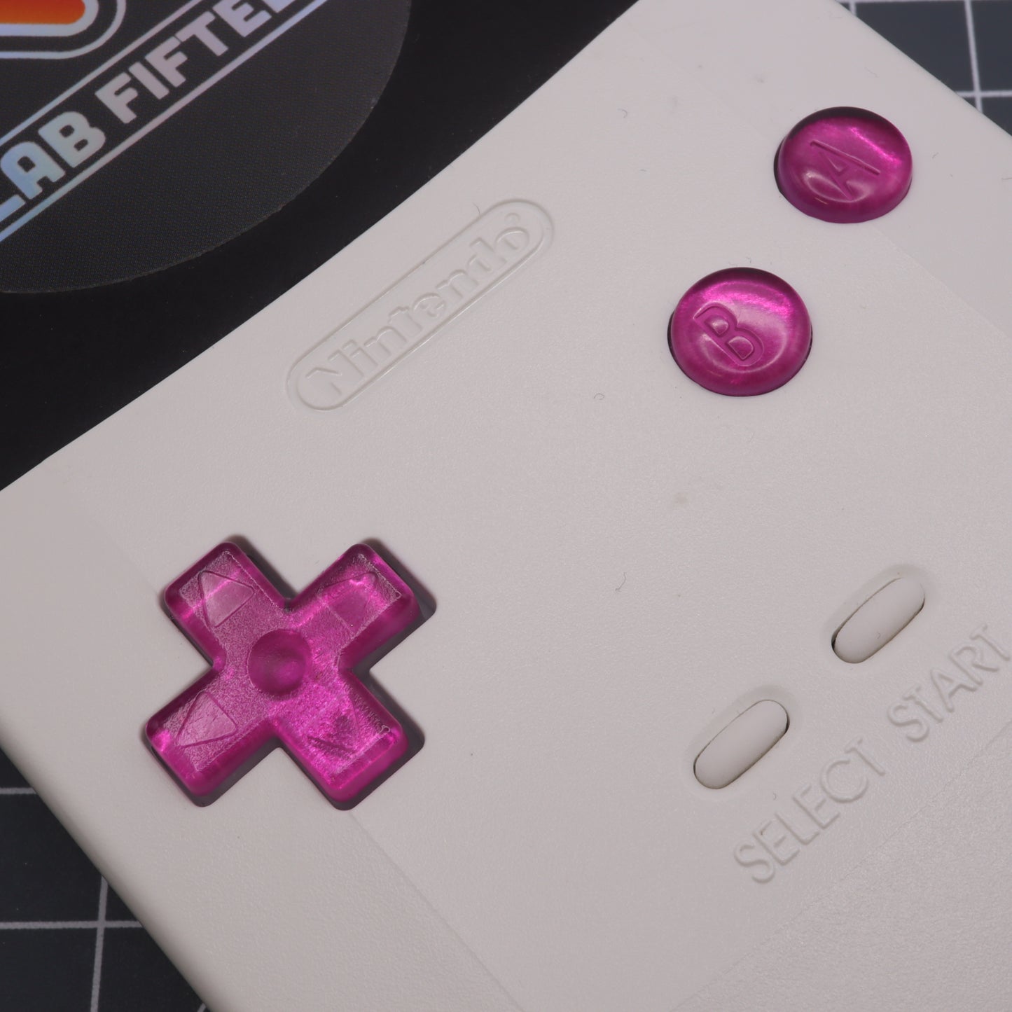 Game Boy Color custom resin buttons by lab fifteen co chrome pink colour inside white console shell