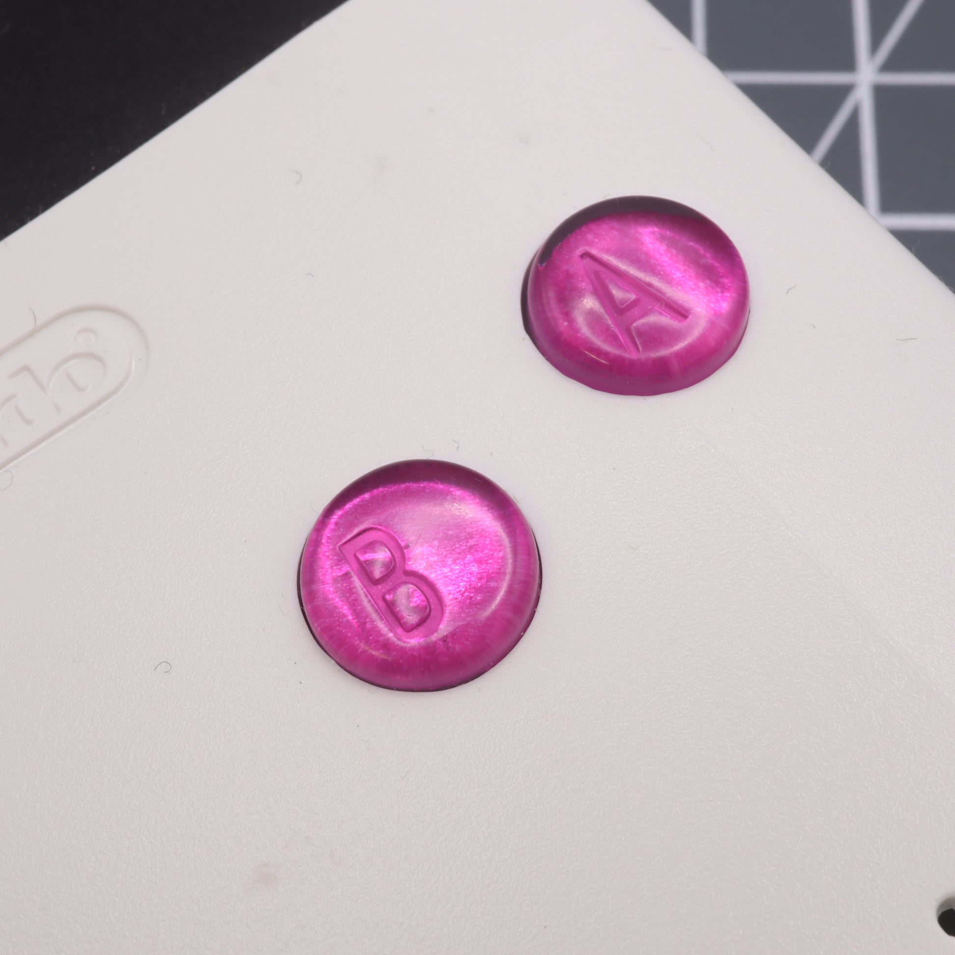 Game Boy Color custom resin buttons by lab fifteen co chrome pink colour in white console housing
