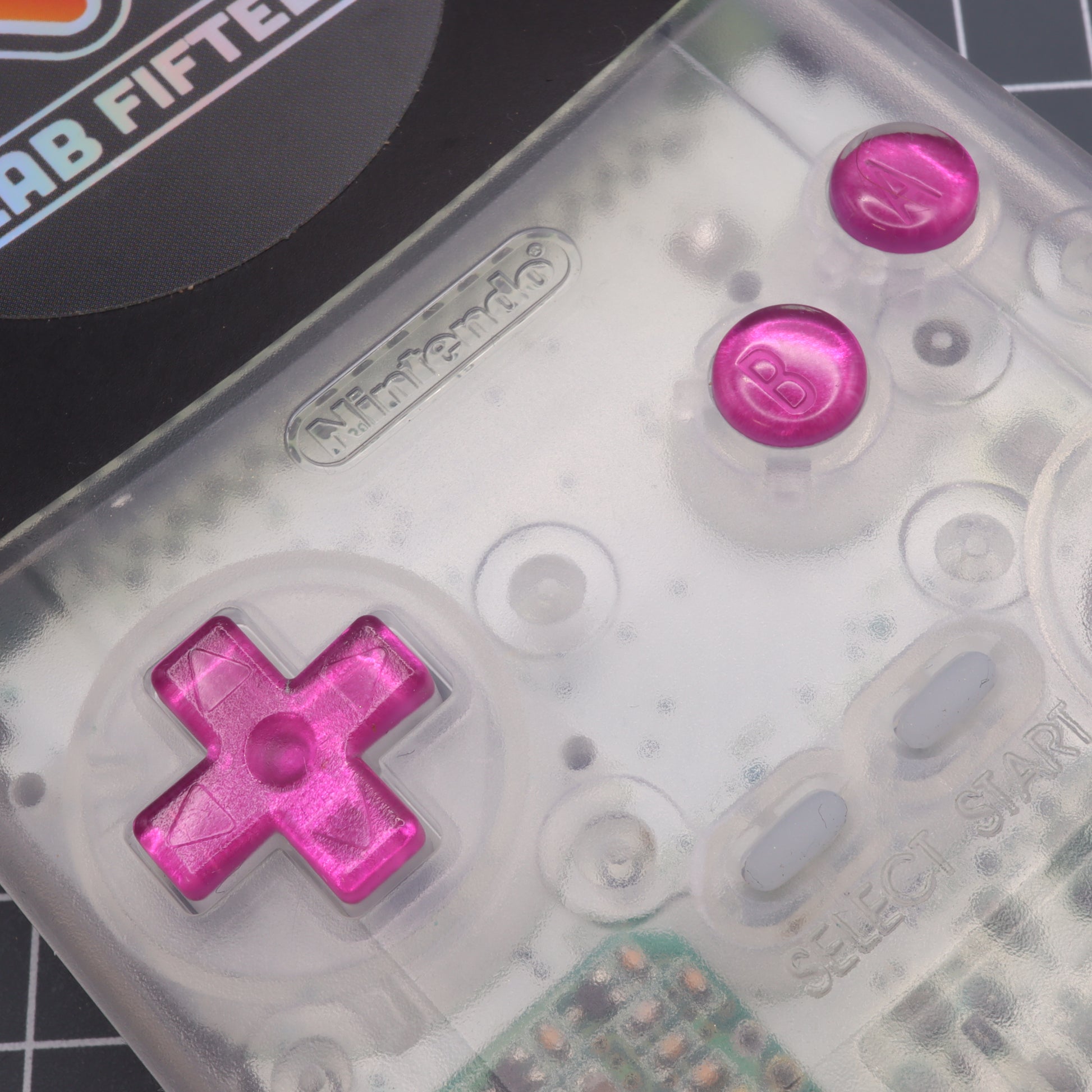 Game Boy Color custom resin buttons by lab fifteen co chrome pink colour in clear transparent shell