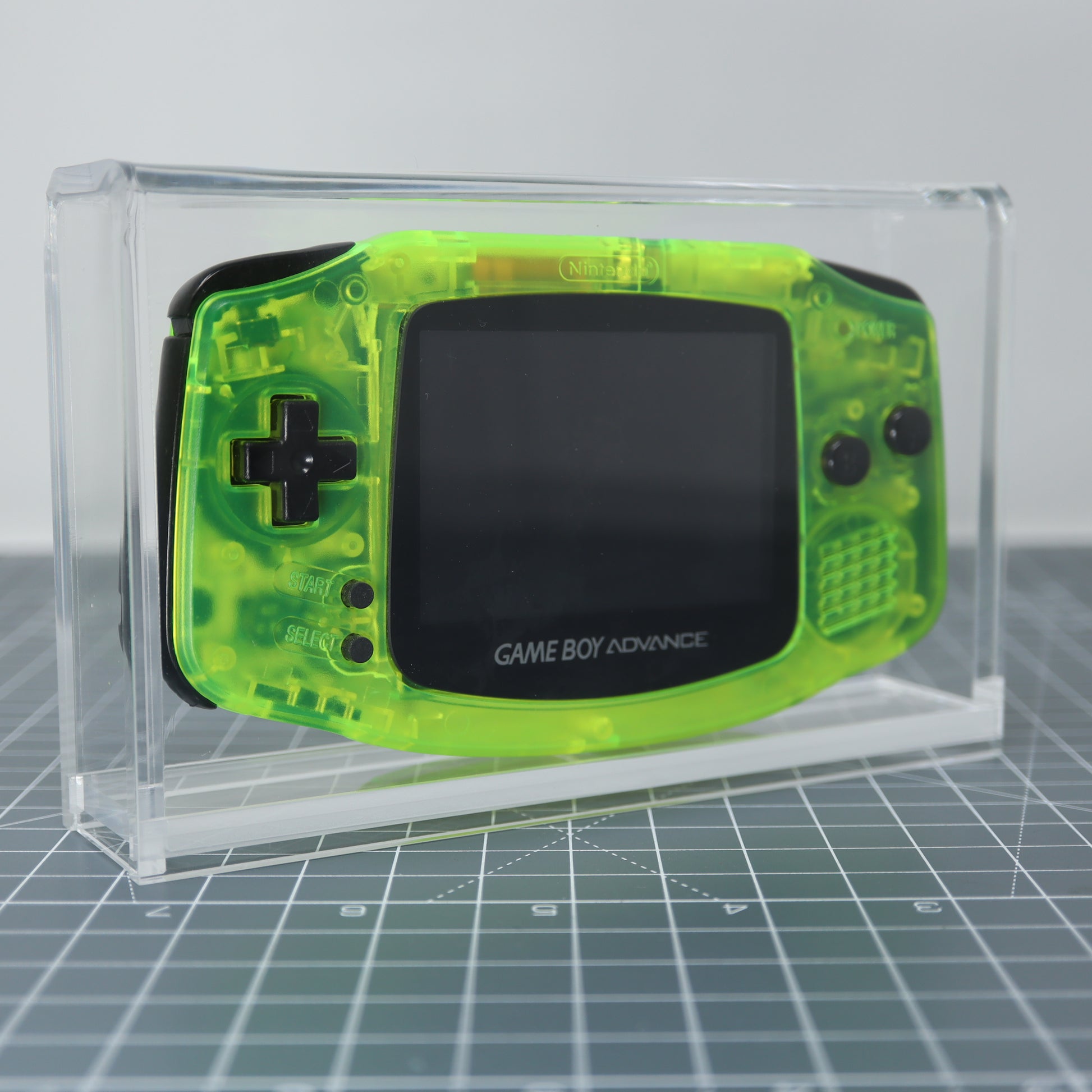 Game boy Advance console safely store inside custom acrylic display capsule